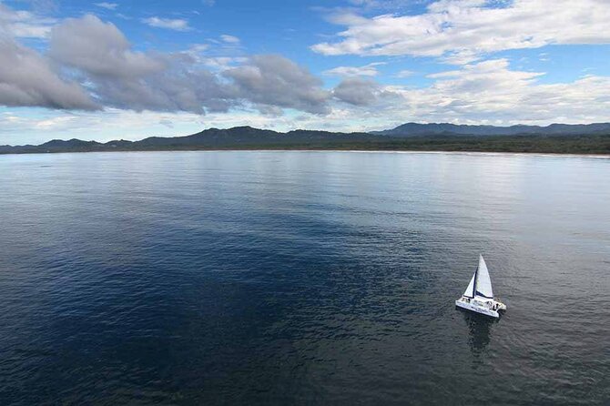 Blue Dolphin Catamaran Snorkeling Sunset Cruise from Tamarindo - From Tamarindo Beach to the open Pacific