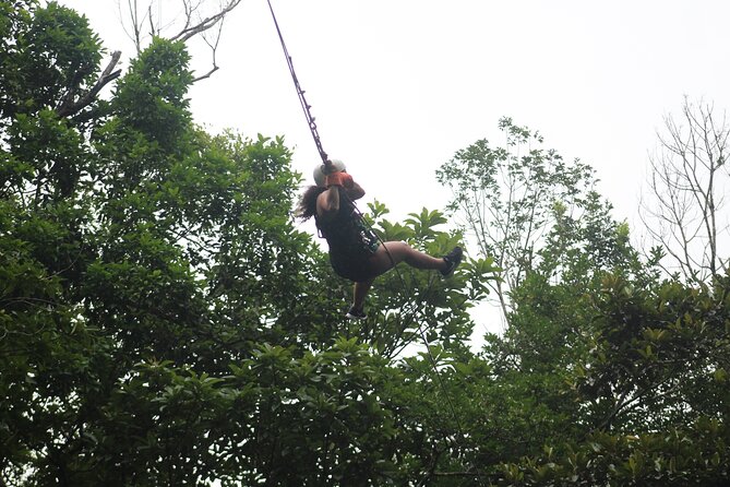 Canopy Tour with Superman and Tarzan Swing in La Fortuna - Getting fitted for the canopy course