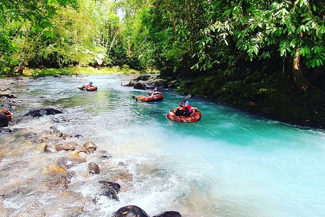 Rio Celeste Aquatic Tubing Adventure - Rapids with a guide in control
